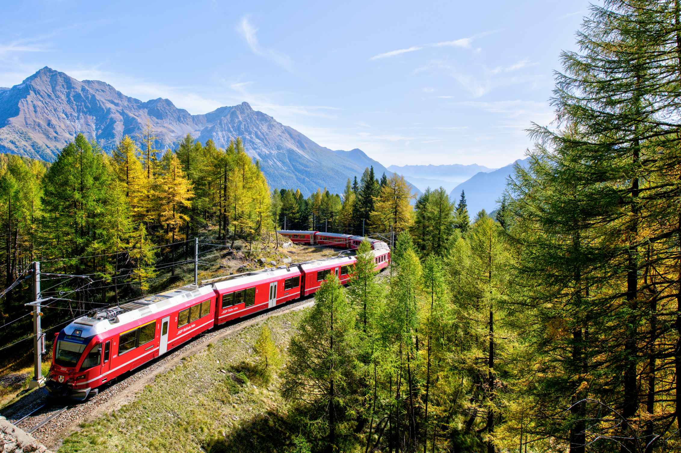 Scenic train journey through a natural landscape